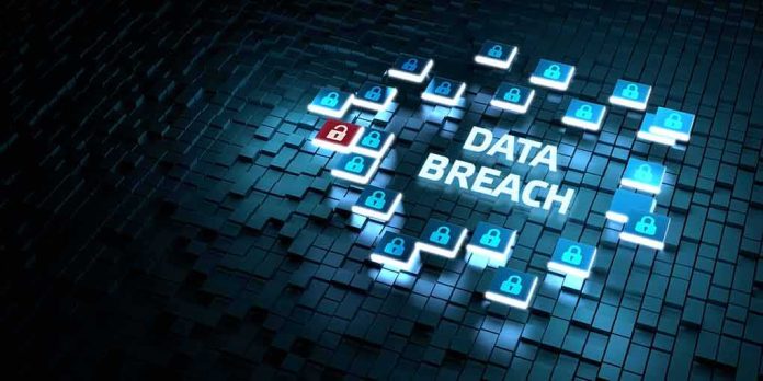 shutterstock_1980549218 Cybersecurity concept with data breach alert and padlock icons