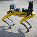Robot Dogs Eye ICE Operations Quadruped robot on pavement with sensors mounted on top