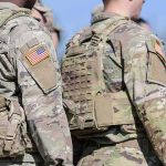 5 Arrested Near U.S.-Used Air Base U.S. soldiers in camouflage uniforms with tactical vests