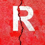 Letter R on cracked red wall