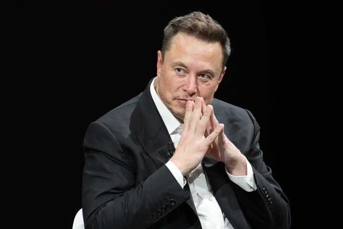 man in a suit with hands clasped thoughtfully