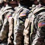 Pentagon Unveils New Military Standards Overhaul Soldiers in camouflage uniforms standing in formation
