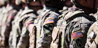 Pentagon Unveils New Military Standards Overhaul Soldiers in camouflage uniforms standing in formation