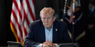 Trump Tells United Nations ‘Freedom Is Coming to Cuba’ Donald Trump seated at a table between two desk phones