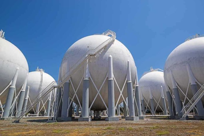 shutterstock_309578045 Spherical industrial storage tanks with support legs and stairways