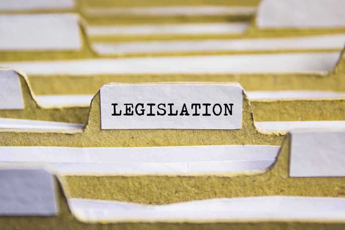 shutterstock_506543236-1 File folder tab labeled legislation