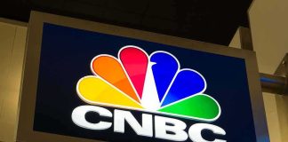 CNBC logo on illuminated sign