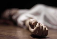 hand of a person lying on the floor