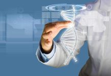 Scientist touching a digital DNA helix