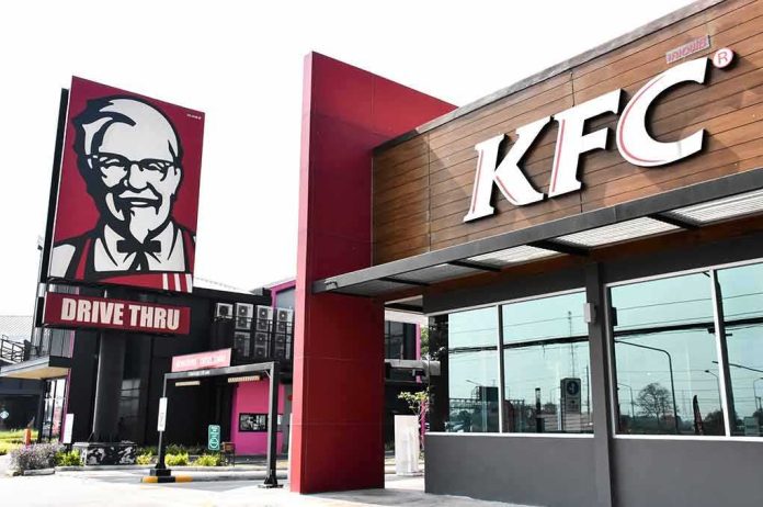 shutterstock_1608294979 KFC restaurant exterior with drive-thru sign