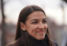 woman smiling in an outdoor close-up portrait