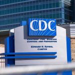 CDC Brings Back BURIED Self-Defense Data CDC headquarters sign outside modern office buildings