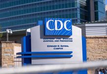 CDC headquarters sign outside modern office buildings