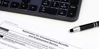 4.2% Jobs Number Is HIDING Something Unemployment benefits application form with keyboard and pen