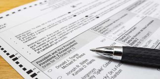 GOP Statehouse Control Is Suddenly at RISK Ballot paper with pen on wooden surface