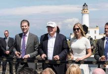Donald Trump, Ivanka Trump, Eric Trump, and Donald Trump Jr. at outdoor ribbon cutting by lighthouse