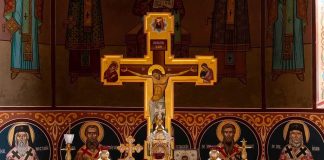 Christians Are Rapidly VANISHING In This Region Orthodox church altar with large gilded cross and icons