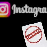 Man’s GRAPHIC Threat Against Trump Heads to Jury Smartphone showing censored symbol with Instagram logo in background