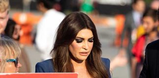 Trump Reportedly OUSTS Don Jr’s Ex-Fiancée Kimberly Guilfoyle walking outdoors among a crowd