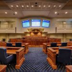 Courtroom interior with wooden benches and judge's bench