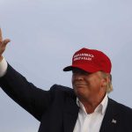 Trump Backs Firing Squad for Fort Hood TERRORIST Donald Trump waving in a red cap