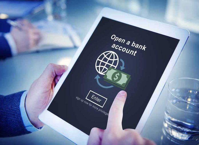 Person using tablet with online bank account signup screen